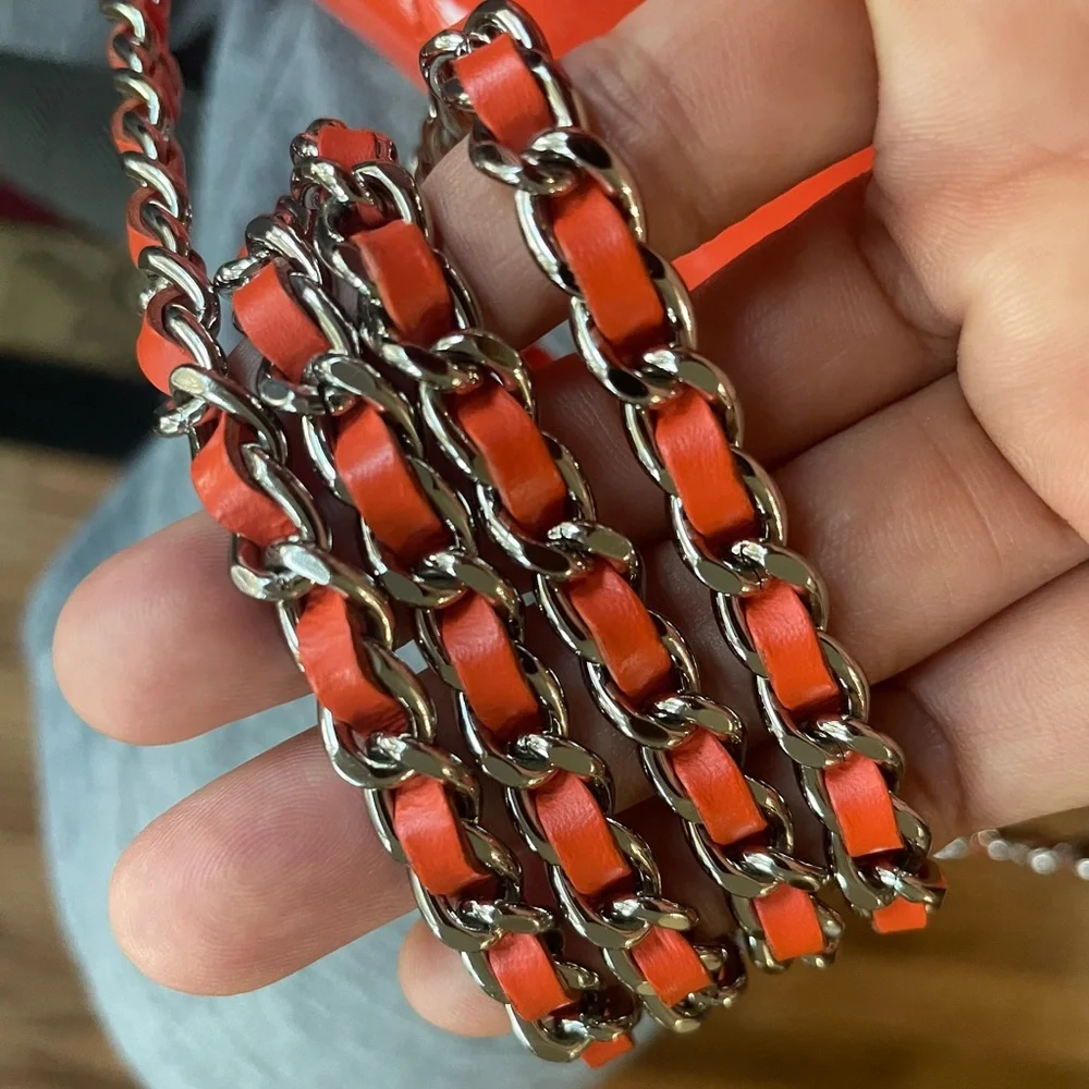 CHANEL Orange Quilted Patent Leather Crossbody Bag